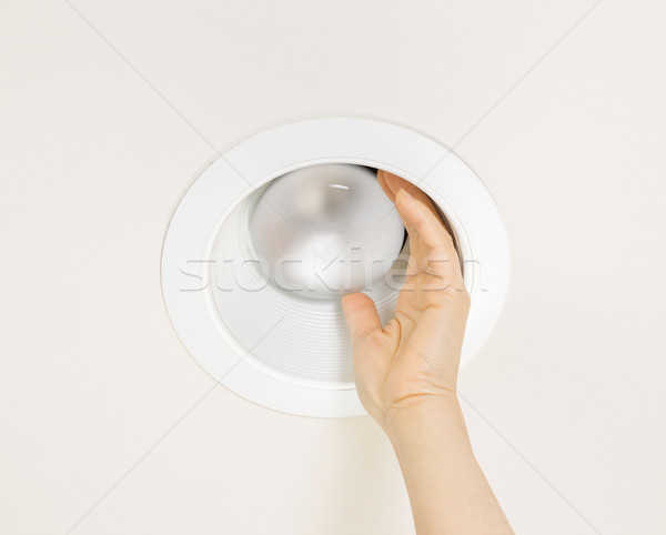 Replacing Burned Out Flood Light in Ceiling Mount  Stock photo © tab62
