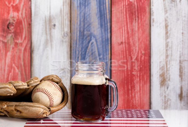 Beer and American Baseball equipment with faded wooden boards pa Stock photo © tab62