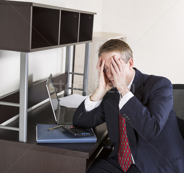 Stock photo: Mature Man Feeling the Pressure of the Income Tax Season