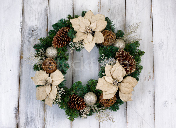 Holiday white Poinsettia Christmas wreath on rustic white wooden Stock photo © tab62