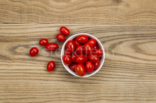 Fresh Grape Tomatoes in Bowl on Aged Wood  Stock photo © tab62