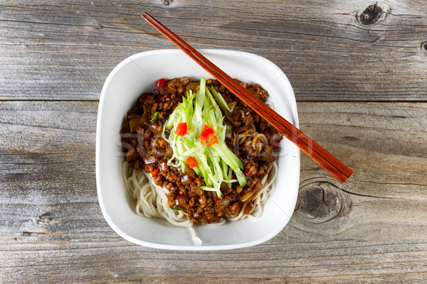 Stock photo: Noodle dish with spicy ground beef and vegetables ready to eat 