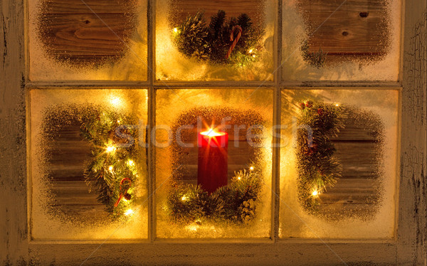 Glowing candle in holiday window  Stock photo © tab62