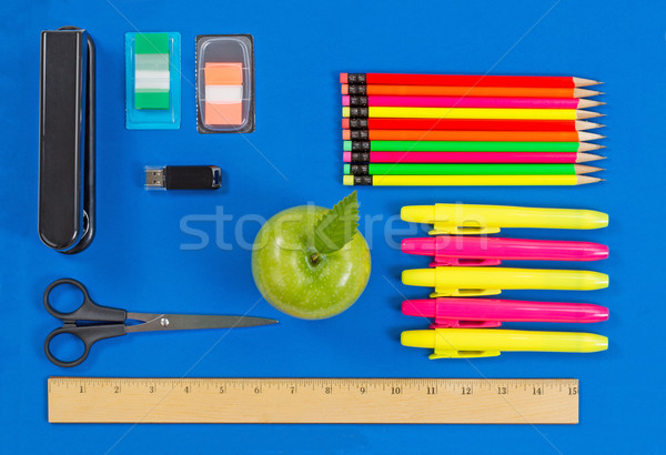 Basic supplies for office or back to school on blue background Stock photo © tab62