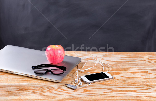 Back to school modern technologies on desk in front of black cha Stock photo © tab62