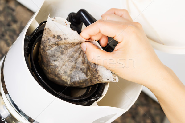 Removing old coffee filter from coffee machine  Stock photo © tab62