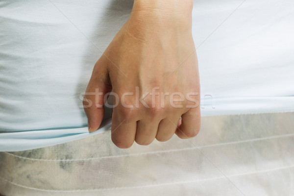 Női készít ágy vízszintes kéz húz Stock fotó © tab62