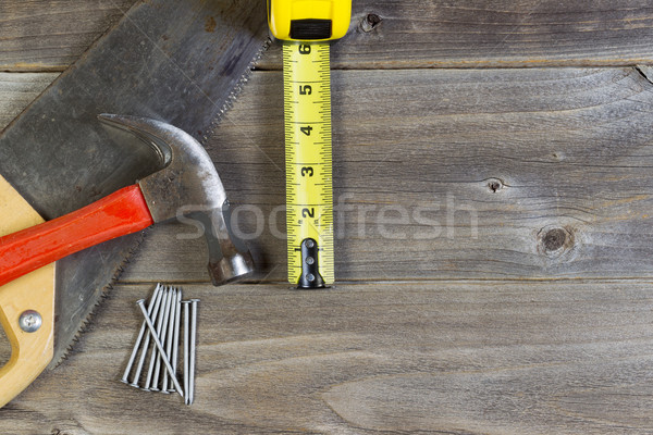 Basic home repair tools on weathered wood  Stock photo © tab62
