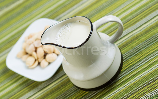 Almond milk in pourer with Almonds  Stock photo © tab62