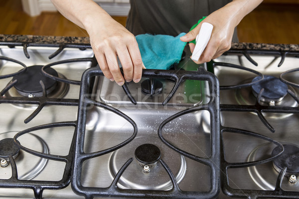 Spraying down Stove Top Range for Cleaning  Stock photo © tab62