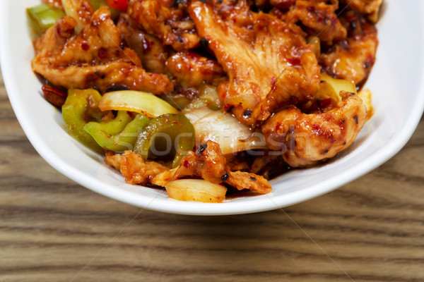 Baharatlı Çin tavuk yemek beyaz çanak Stok fotoğraf © tab62