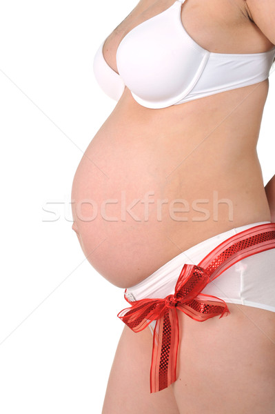 Rouge arc autour ventre jeunes femme enceinte [[stock_photo]] © taden