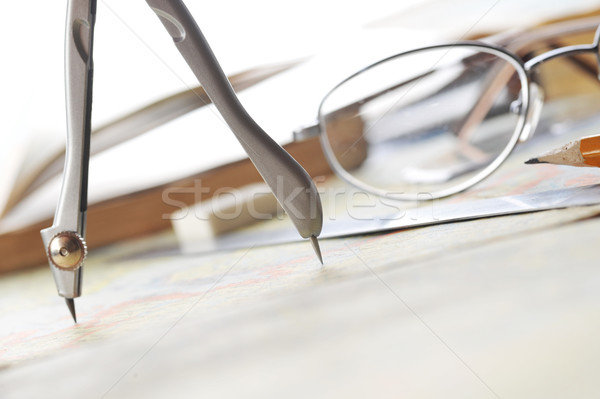 Stock photo:  map and  glasses