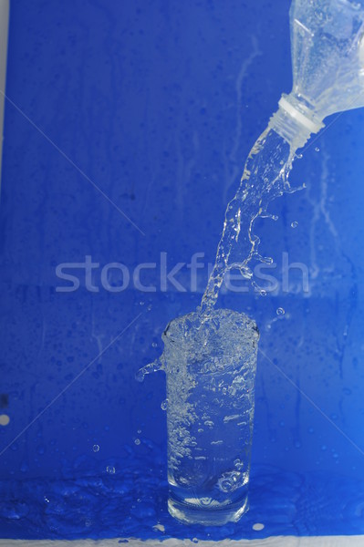 Water flows from  bottle Stock photo © taden
