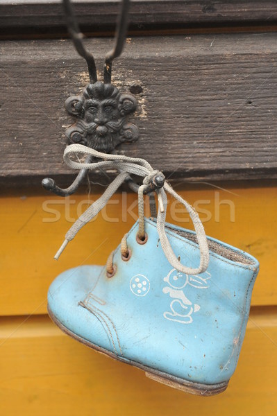 old baby shoes as wall decoration Stock photo © taden