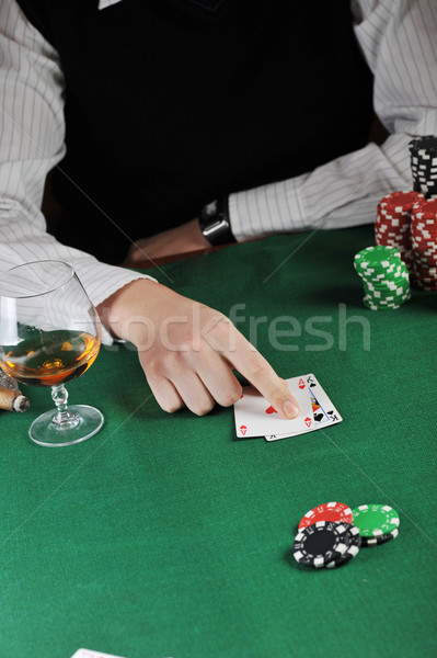 Kártya játék férfi ül asztal kártyapakli Stock fotó © taden