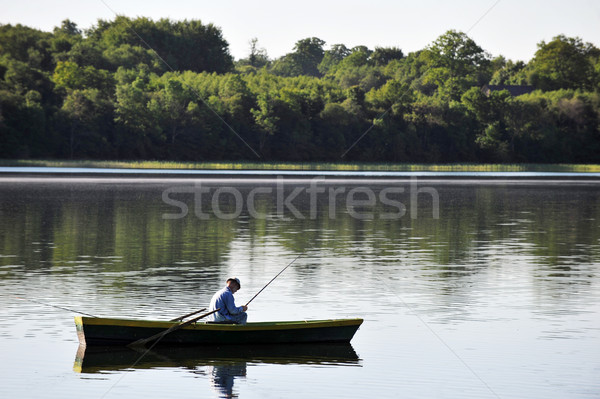 Pescador barco verano día pesca lago Foto stock © taden