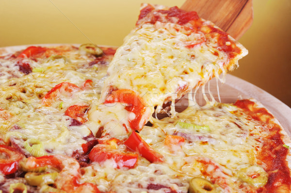 Pizza slice smakelijk vlees groenten pizza diner Stockfoto © taden