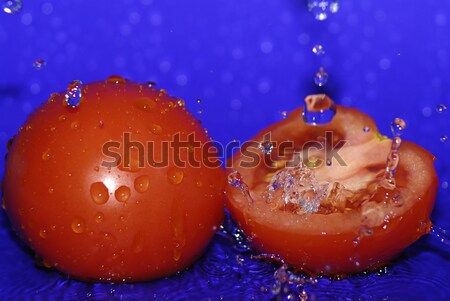 water drops on sliced tomato Stock photo © taden