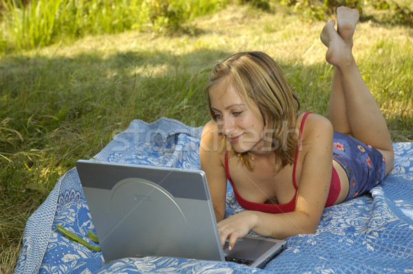 girl working with notebook outdoor Stock photo © taden