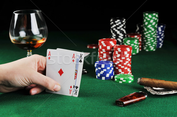 Carta giocare uomo seduta tavola carte da gioco Foto d'archivio © taden