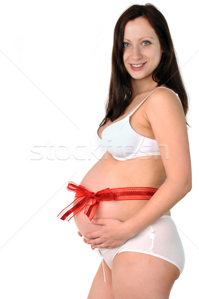 Rouge arc autour ventre jeunes femme enceinte [[stock_photo]] © taden