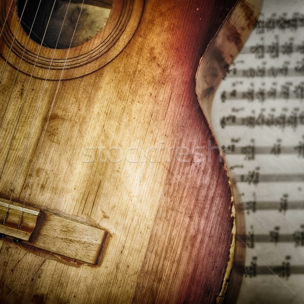 Akoestische gitaar leggen bladmuziek muziek vintage patroon Stockfoto © taden