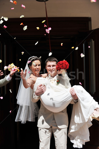 Stockfoto: Onlangs · paar · rozenblaadjes · bruiloft · liefde · vrouwen