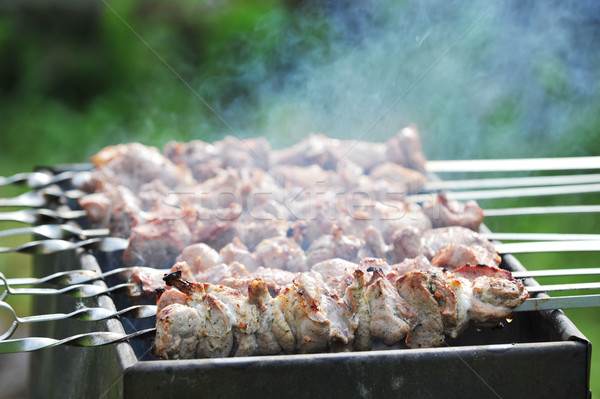 Fleisch Scheiben Vorbereitung Sauce Feuer Rauch Stock foto © taden