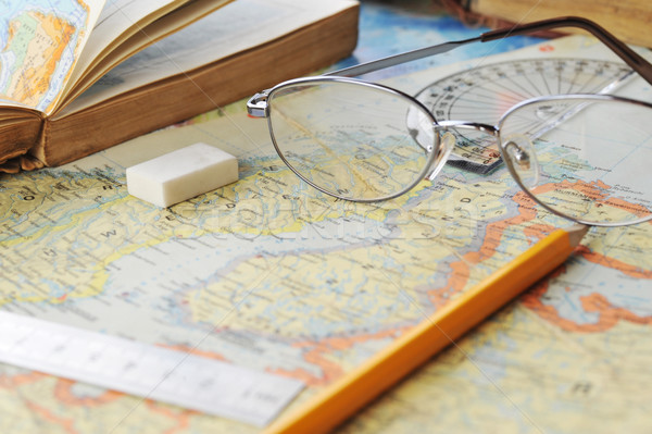 Stock photo:  map and  glasses