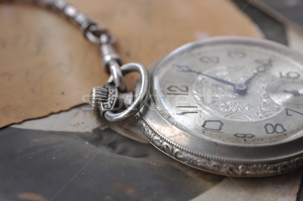 very old watch on the post card and photo Stock photo © taden