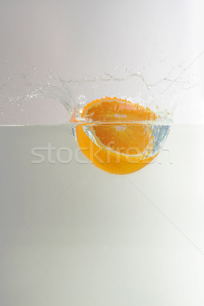 Narancs belépés víz étel gyümölcs háttér Stock fotó © taden