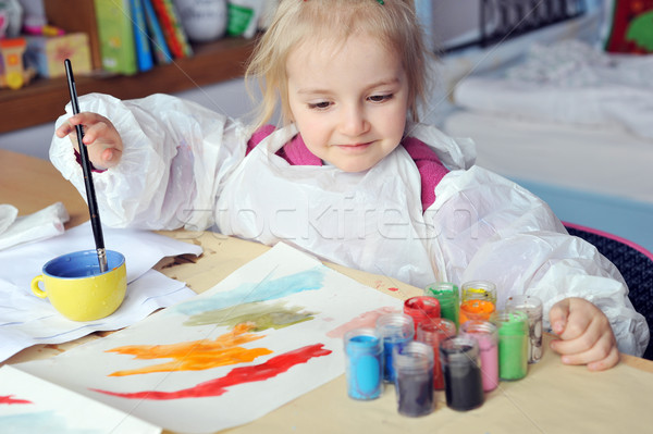  girl is drawing Stock photo © taden