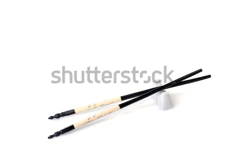 asian chopsticsk on white close up Stock photo © taden