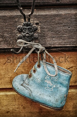 old baby shoes as wall decoration Stock photo © taden