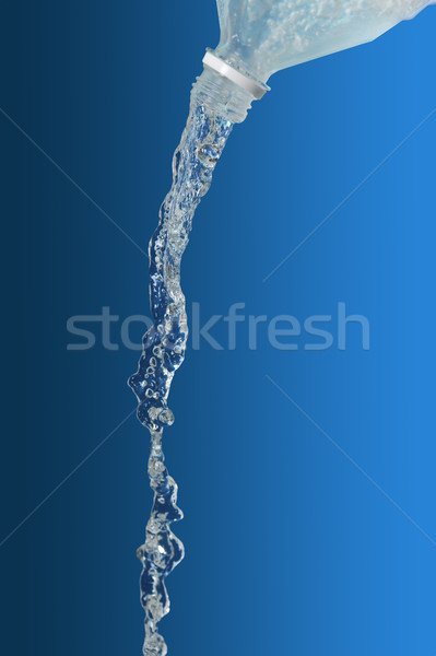 Water flows from  bottle Stock photo © taden