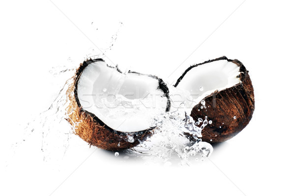 Agrietado coco grande Splash alimentos Foto stock © taden