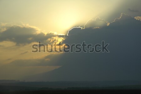 sun through  clouds Stock photo © taden