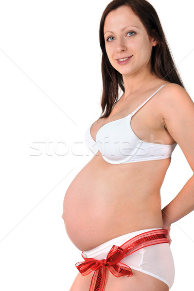 Rojo arco alrededor vientre jóvenes mujer embarazada Foto stock © taden
