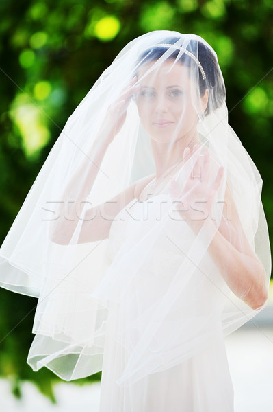 Bruid witte jurk groene bomen bloem bruiloft Stockfoto © taden