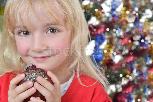 Stock photo:  girl near Christmas fir-tree