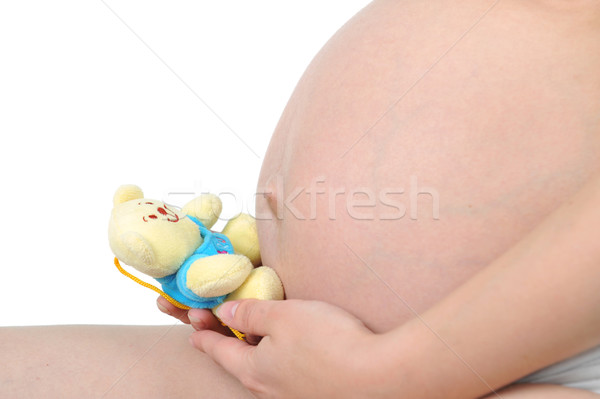 Mujer embarazada juguete jóvenes hermosa manos mujer Foto stock © taden