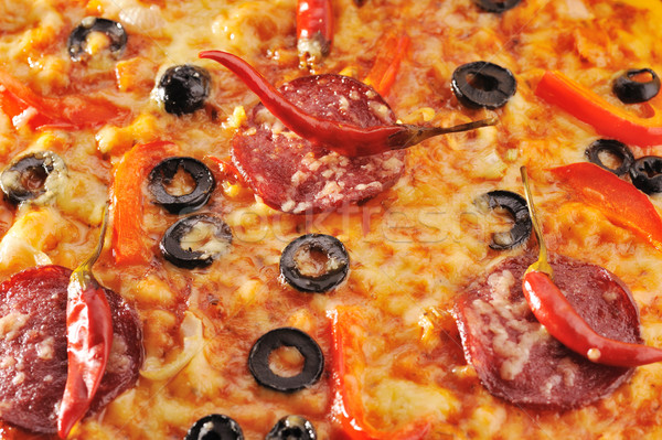 Pizza papryka pomidory ser czarne oliwki Zdjęcia stock © taden