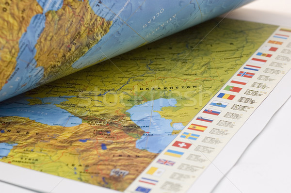 Opened book with map on it Stock photo © taden