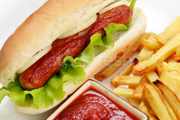 Smakelijk hot dog smakelijk frietjes witte plaat Stockfoto © taden