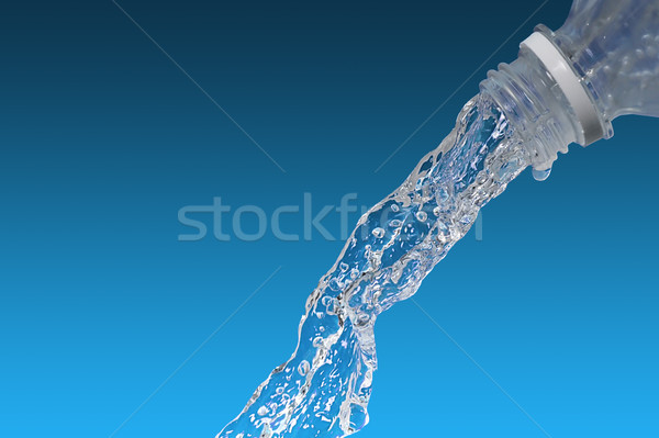 Water flows from  bottle Stock photo © taden
