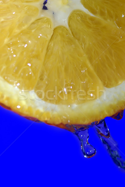 water dribble from on sliced orange Stock photo © taden