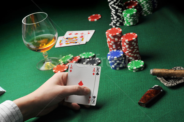 Carte jouer homme séance table cartes à jouer [[stock_photo]] © taden