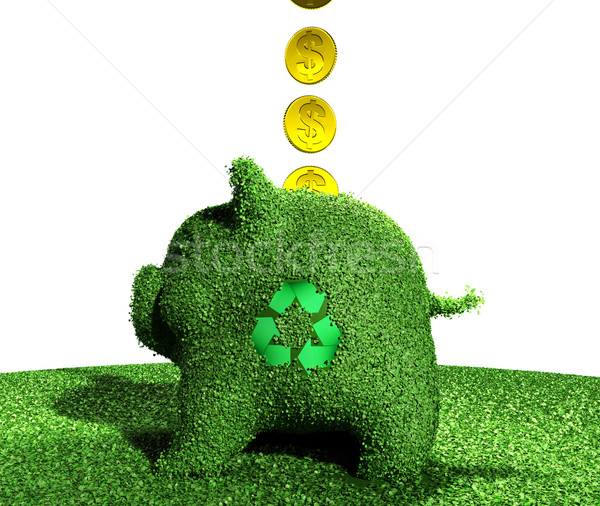 coins go into a recycling piggy bank of grass Stock photo © TaiChesco