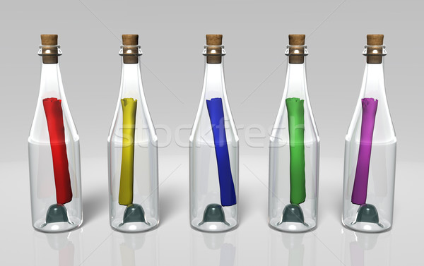 Diverso colorato messaggi bottiglie cinque trasparente Foto d'archivio © TaiChesco